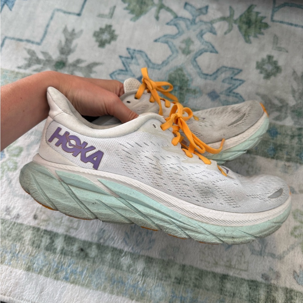 Hoka Women's White Running Shoes with Mint Midsole and Yellow Laces